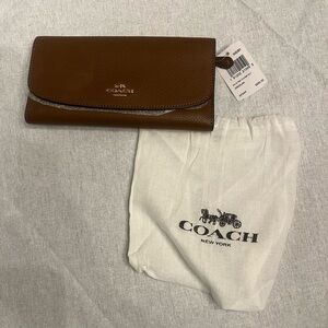 Brand new large COACH wallet/check book with tags